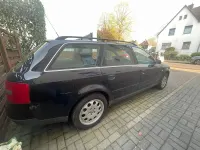 Używany Audi A6 165 KM (121 kW) 1999 Czarny Kombi
