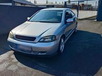 Second-hand Opel Astra 147 CP (108 kW) 2000 Argintiu Coupe