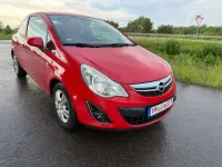 Gebraucht Opel Corsa Satellite 69 PS (50 kW) 2011 Magma rot (b) Kleinwagen