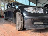 Gebraucht BMW 116 122 PS (89 kW) 2010 Schwarz Kleinwagen