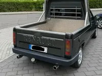 Używany Renault Rapid 74 KM (54 kW) 1993 Szary Pickup