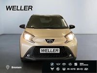 Gebraucht Toyota Aygo 72 PS (52 kW) 2024 Ginger beige / night sky black Kleinwagen