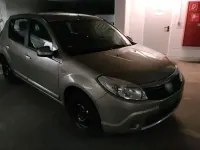 Używany Dacia Sandero 90 KM (66 kW) 2011 Beżowy Sedan/Limuzyna