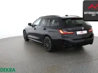 Gebraucht BMW 320e M Sport 204 PS (150 kW) 2022 Black sapphire Kombi