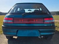 Gebraucht Mazda 323 88 PS (64 kW) 1993 Grün Kleinwagen