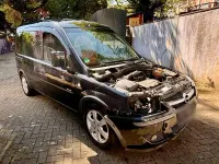 Używany Opel Combo 90 KM (66 kW) 2005 Czarny Minivan