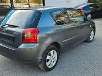 Używany Toyota Corolla Sol 116 KM (85 kW) 2003 Szary Sedan/Limuzyna