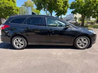 Używany Ford Focus 125 KM (91 kW) 2013 Czarny Sedan/Limuzyna