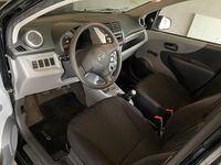 Gebraucht Nissan Pixo 68 PS (50 kW) 2011 Schwarz Kleinwagen