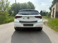 Używany Opel Astra Dynamic 125 KM (91 kW) 2016 Biały Sedan/Limuzyna