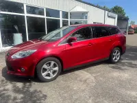 Second-hand Ford Focus Titanium 150 CP (110 kW) 2013 Roșu Break