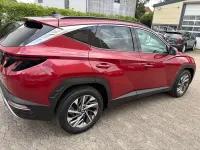 Gebraucht Hyundai Tucson 136 PS (100 kW) 2021 Sunset red SUV