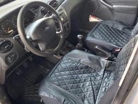 Second-hand Ford Focus 110 CP (80 kW) 2004 Argintiu Hatchback