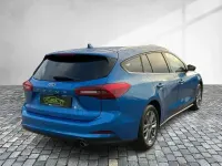 Gebraucht Ford Focus Titanium 125 PS (91 kW) 2024 Desert island blue metallic (metallic) Kombi