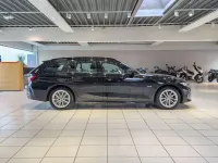 Gebraucht BMW 320e Shadowline 163 PS (119 kW) 2023 Schwarz Kombi