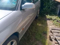 Second-hand Opel Omega 144 CP (105 kW) 2000 Argintiu Berlinǎ