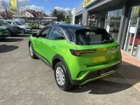 Gebraucht Opel Mokka Enjoy 131 PS (96 kW) 2024 Ikone grün metallic SUV