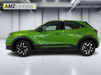 Gebraucht Opel Mokka Elegance 131 PS (96 kW) 2024 Lackierung matcha green/typ au SUV