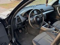 Gebraucht BMW 116 122 PS (89 kW) 2007 Schwarz Kleinwagen