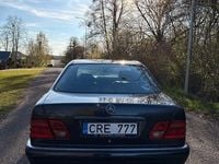 Second-hand Mercedes E250 150 CP (110 kW) 1998 Negru Berlinǎ