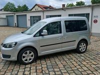 Second-hand VW Caddy 105 CP (77 kW) 2012 Argintiu Monovolum