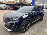 Gebraucht Peugeot e-2008 Allure 100 kW (136 PS) 2021 Lackierung schwarz perla nera/typ aussen (metallic) SUV