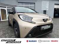 Gebraucht Toyota Aygo X Pulse 72 PS (52 kW) 2024 Ginger beige (4u9)/ black mica SUV