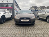 Gebraucht Mitsubishi Colt 75 PS (55 kW) 2011 Braun Kleinwagen