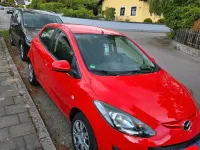 Gebraucht Mazda 2 75 PS (55 kW) 2011 Rot Kleinwagen