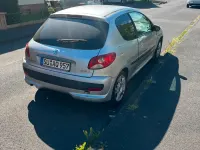 Gebraucht Peugeot 206+ 79 PS (58 kW) 2009 Grau Kleinwagen
