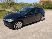 Second-hand BMW 116 122 CP (89 kW) 2011 Negru Hatchback