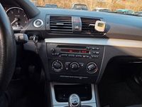 Gebraucht BMW 116 116 PS (85 kW) 2009 Schwarz Kleinwagen