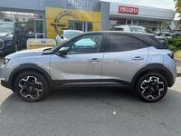 Gebraucht Opel Mokka Ultimate 131 PS (96 kW) 2023 Kontrast grau/quarz silber (metallic) SUV