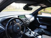 Używany BMW M135 Performance 450 KM (330 kW) 2015 Biały Hatchback