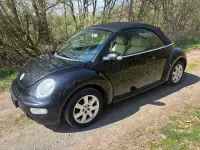 Gebraucht VW New Beetle Highline 116 PS (85 kW) 2004 Schwarz Kleinwagen