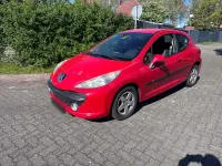 Gebraucht Peugeot 207 73 PS (53 kW) 2009 Rot Kleinwagen