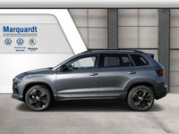 gebraucht Skoda Karoq Sportline 2.0TSI 4x4 Pano AHK ACC Side