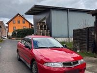 Gebraucht Mitsubishi Carisma 90 PS (66 kW) 1997 Rot Limousine
