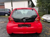 Gebraucht Toyota Aygo 68 PS (50 kW) 2010 Rot Kleinwagen