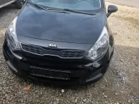 Gebraucht Kia Rio 84 PS (61 kW) 2014 Schwarz Kleinwagen