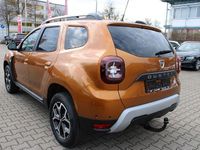 Używany Dacia Duster 116 KM (85 kW) 2021 Pomarańczowy SUV