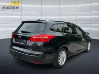 Gebraucht Ford Focus Titanium 125 PS (91 kW) 2015 Pantherschwarz metallic Kombi