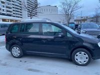 Second-hand VW Touran 150 CP (110 kW) 2005 Negru Monovolum