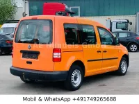 Używany VW Caddy 102 KM (75 kW) 2011 Pomarańczowy Minivan