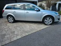 Używany Opel Astra Edition 110 KM (80 kW) 2011 Srebrny Kombi