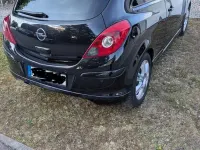 Używany Opel Corsa 101 KM (74 kW) 2011 Czarny Hatchback