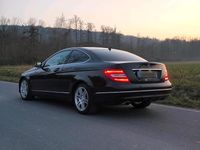 Używany Mercedes C220 170 KM (125 kW) 2012 Czarny Coupe