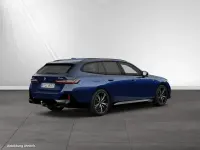 Gebraucht BMW 550e M Sport 489 PS (359 kW) 2025 Bmw individual tansanitblau metallic Kombi