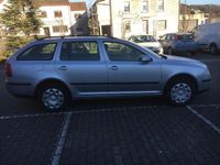 Second-hand Skoda Octavia Ambiente 105 CP (77 kW) 2008 Argintiu Break