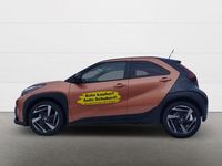 Gebraucht Toyota Aygo X 116 PS (85 kW) 2026 Cinnamon bronze metallic / bla SUV
